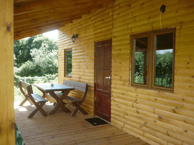 AGROTURYSTYKA  Bartosze Domki Apartamenty Sala kominkowa